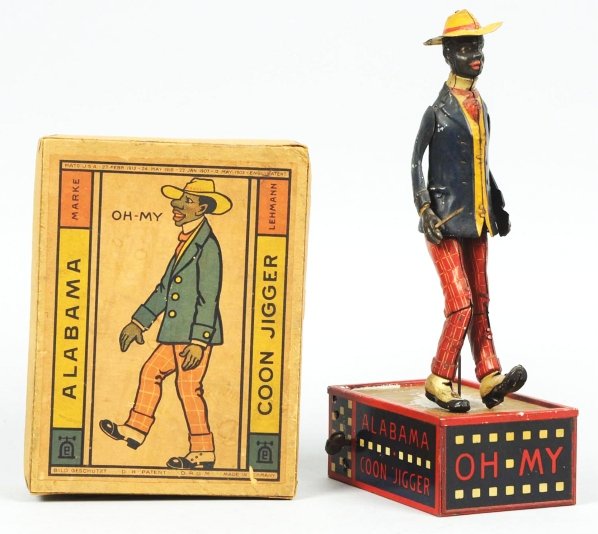 Tin Litho Lehmann Roof Dancing Wind-Up Toy.: German. Working. Figure with partial flag holder in hand. Moderate to heavy litho loss to dancing floor. Also, some scratching to figure. Includes original box with direction label under lid. Conditio