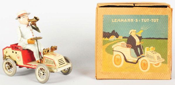 Tin Litho Lehmann Tut-Tut Auto Wind-Up Toy.: German. Working. Original headlights. Unusualy nice condition with beautiful face. One small spots of paint peeling behind right leg. Bellows still working. Includes scarce original box with nice colo