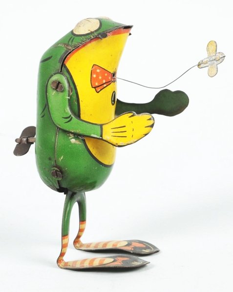 Scarce Tin Litho Wind-Up Frog Toy.: German. Working. Made by CKO. Original butterfly on wire but missing tongue. Some scratching and wear overall. Condition (Very Good). Size 4 - 3/4" T.