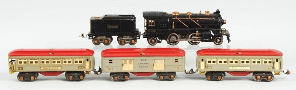 Lionel No. 262 O-Gauge Passenger Train Set.: Tinplate. Pre-war. Working. Includes no. 262 steam type engine with matching no. 262T Lionel Lines tender, no. 600 pullman car, no. 602 baggage car, and no. 601 observation car. Cars have latched roof