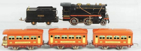 Tinplate Lionel No. 258 Passenger Train Set.: American. O-gauge. Includes no. 258 steam type engine with orange striping, matching Lionel Lines tender, two no. 529 pullman cars, and one no. 530 observation car. Cars are in terracotta. Set has ove