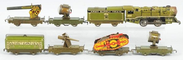 Tinplate Marx Army Supply Train.: American. Variation with no. 897 steam-type engine. Comes with matching no. 500 tender and six cars. Cars include two gun cars, two searchlight cars, one flat car with wind-up tank, and one radio car.