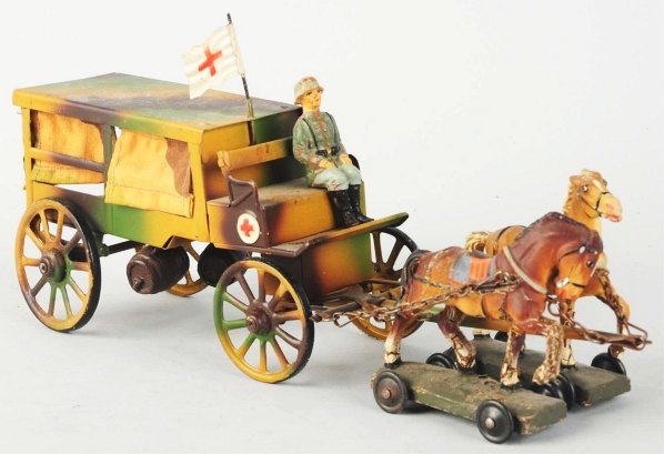 Lineol 6.5cm Tinplate Horse-Drawn Ambulance.: Paint wear on the horses. Tinplate is in very nice condition. Original flag and Lineol hang tag. Condition (Very Good - Excellent). Size 10" L.