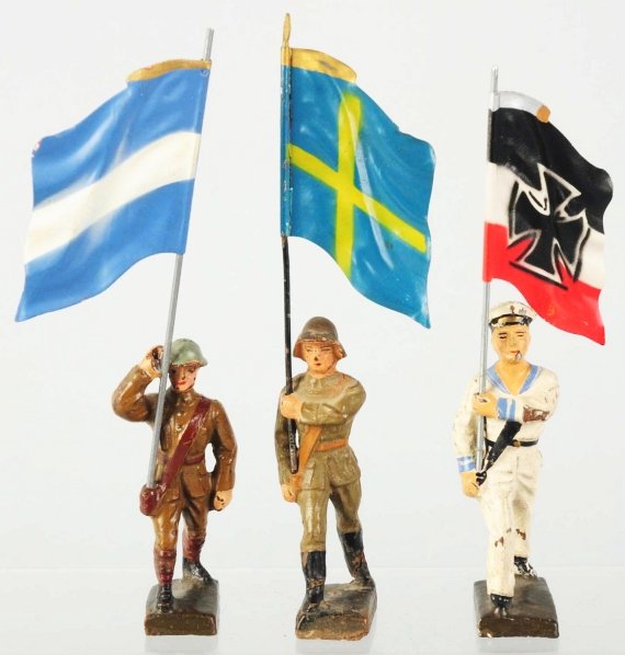 Lot of 3: Lineol 7cm Flagmen.: Includes Navy in white uniform, Sweden, and Argentina (6.5cm size). Condition (Good).