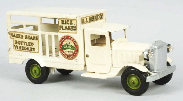 Pressed Steel Metalcraft Heinz Pickle Truck Toy.: Nice decals with only minor chipping and wear. Missing spare tire with tire hook. Condition (Excellent). Size 11 - 3/4" L.