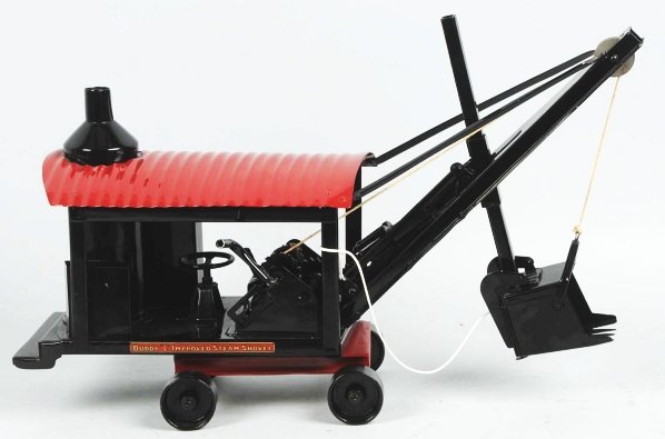 Pressed Steel Buddy L Steam Shovel Toy.: American. Completely restored with new decals. ADDITIONAL INFO: This lot was originally from the Kaufman Collection. Condition (Restored). Size 24" L.