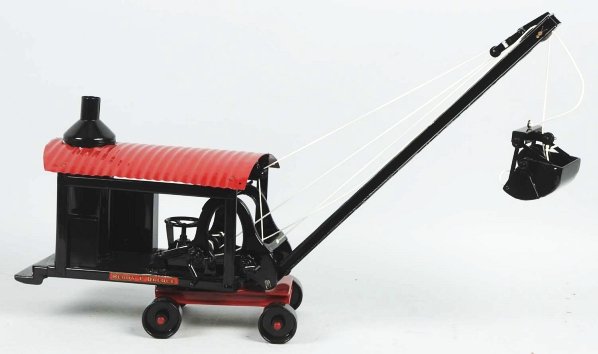 Pressed Steel Buddy L Dredge Shovel.: American. Scarce piece. Completely restored with new decals. Condition (Restored). Size 23" L.