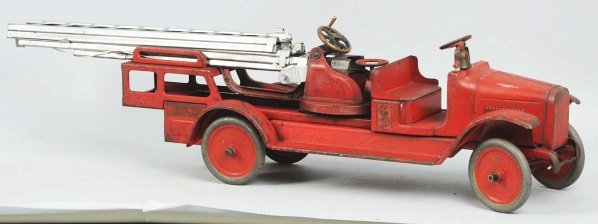 Pressed Steel Buddy L Aerial Fire Ladder Truck.: American. Original bell and ladders but ladders appear to be repainted. All decals are present but are slightly faded and chipped. Truck has moderate to heavy scratching on fenders and hood. Condition