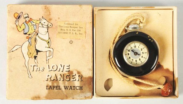 Lone Ranger Character Lapel Watch.: 1940. New Haven. Working. Watch has some chipping, especially to back decal. Includes original box with insert. Box is faded and has some staining. Condition (Good - Very Good).