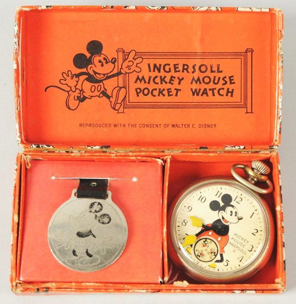 Walt Disney Mickey Mouse Character Pocket Watch.: 1933. Made by Ingersoll. Watch is working and has three Mickey's that run and act as the second hand. Comes with an embossed watch fob with leather band, original box, and replacement watch fob insert