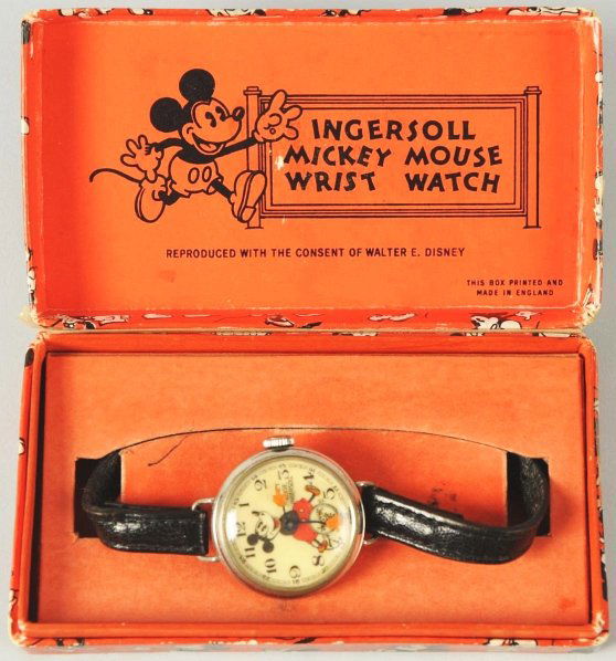Walt Disney Mickey Mouse Character Wrist Watch.: Scarce watch made in Great Britain. Marked "Ingersoll". Watch is sprung and does not work. Small, think black band for girls. Three Mickey's act as the second hand. Watch has been worn and has wear to