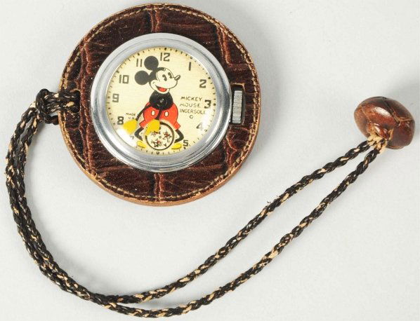 Walt Disney Mickey Mouse Lapel Watch.: Scarce. Working. Running Mickey's on second hand. Watch is inside leather casing. Condition (Very Good).