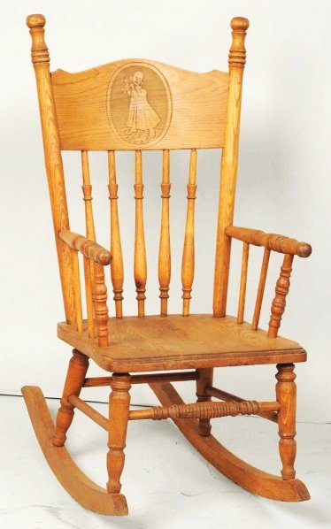 Vintage Yellow Kid Wooden Rocking Chair.: Turn-of-the-century. Very scarce with embossed relief of Yellow Kid on top, playing an instrument. Appears to be made of oak and is very nicely done. Just very little wear. Condition (Very Good - Exce