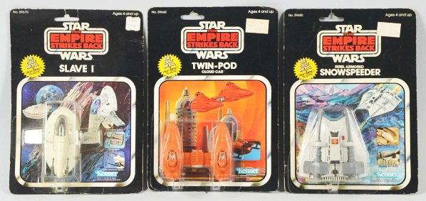 Lot of 3: Star Wars Empire Strikes Back Vehicles.: Made by Kenner. All are on cards. Includes one Twin-Pod Cloud Car, one Rebel Armored Snowspeeder, and one Slave I Ship. All are sealed in their original packaging. Cards are bent, have creasing, and p