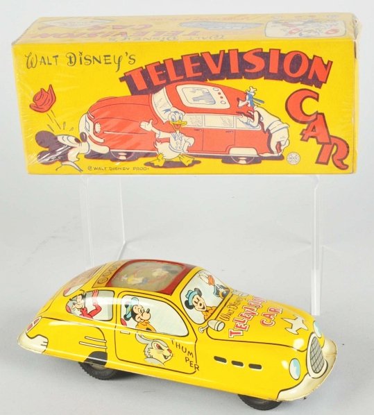Tin Litho Marx Disney Television Car Friction Toy: American. Working but needs flint to spark & does not drive properly. When in operation, car shoots sparks under roof to simulate TV action. Lithographed Disney characters on all sides of car. Include