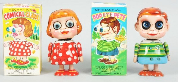 Lot of 2: Tin Litho TPS Figural Wind-Up Toy.: Japanese. Working. Includes one Pop Eye Pete and Comical Clara. When wound, figures wobble back and forth and eyes pop out. Some creasing to boxes. Condition (Near Mint). Size Each Box: 5 - 1/4" x 2 -
