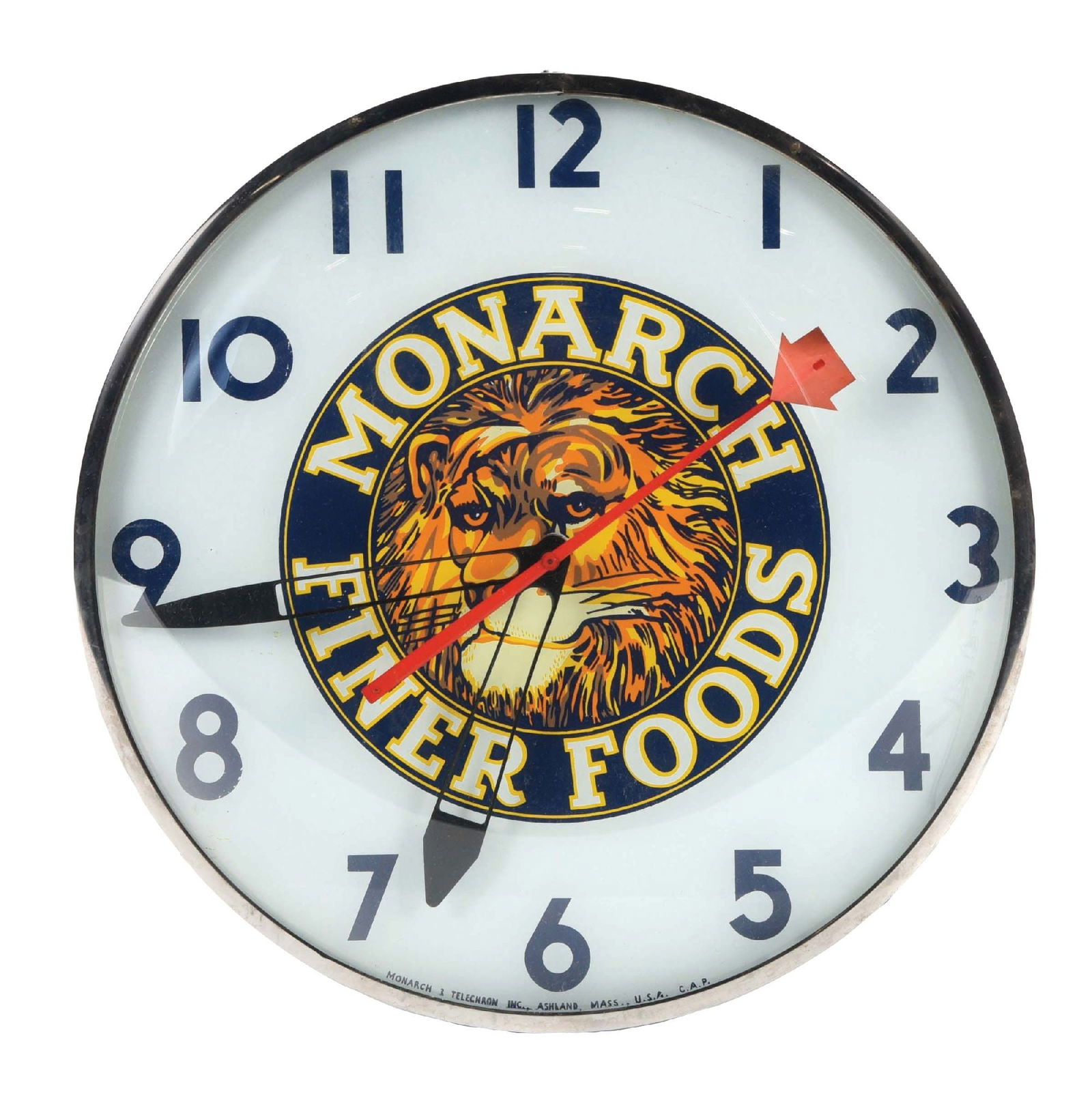 MONARCH FINER FOODS CLOCK W/ LION GRAPHIC: Marked "Telechron Inc. Ashland, Mass." This c. 1950s light-up clock from Monarch Finer Foods features a colorful graphic of a lion in the center. CONDITION: The interior face of the clock remains clea