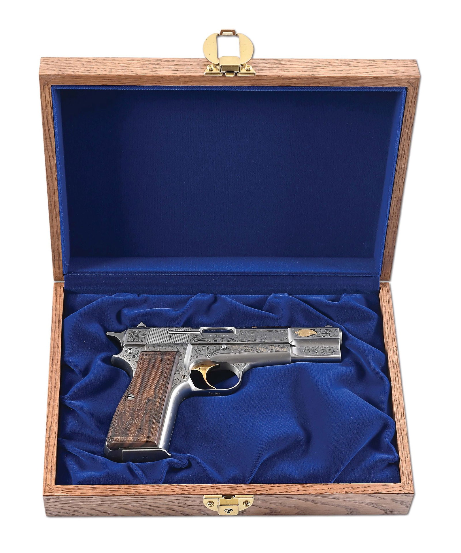 (M) ENGRAVED GOLD CLASSIC BROWNING HIGH POWER SEMI-AUTOMATIC PISTOL WITH DISPLAY CASE.: Classic configuration with blade front sight, square notch flat top rear sight, spur hammer, and external extractor. Gold washed trigger and walnut grips with raised checkered panels with beaded borde