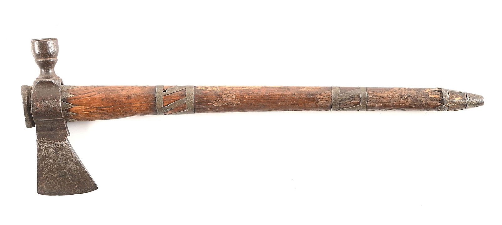PIPE TOMAHAWK WITH PEWTER DECORATED HAFT.: Circa 1800 pipe tomahawk with hand forged iron, British style blade with slightly curved bowl. Haft is most likely hickory with typical geometric pewter inlay with teardrop shaped eye. Similar example