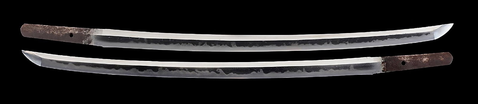WAKIZASHI ATTRIBUTED TO ECHIZEN KANENORI WITH SAYAGAKI BY KANZAN.: 49.4cm (approximately 19 - 7/16") nagasa of classic shinogi zukuri form. Highly active and attractive gunome midare hamon with plentiful nie, sunagashi, tobiyaki, and ashi. Nioiguchi is tight and brig