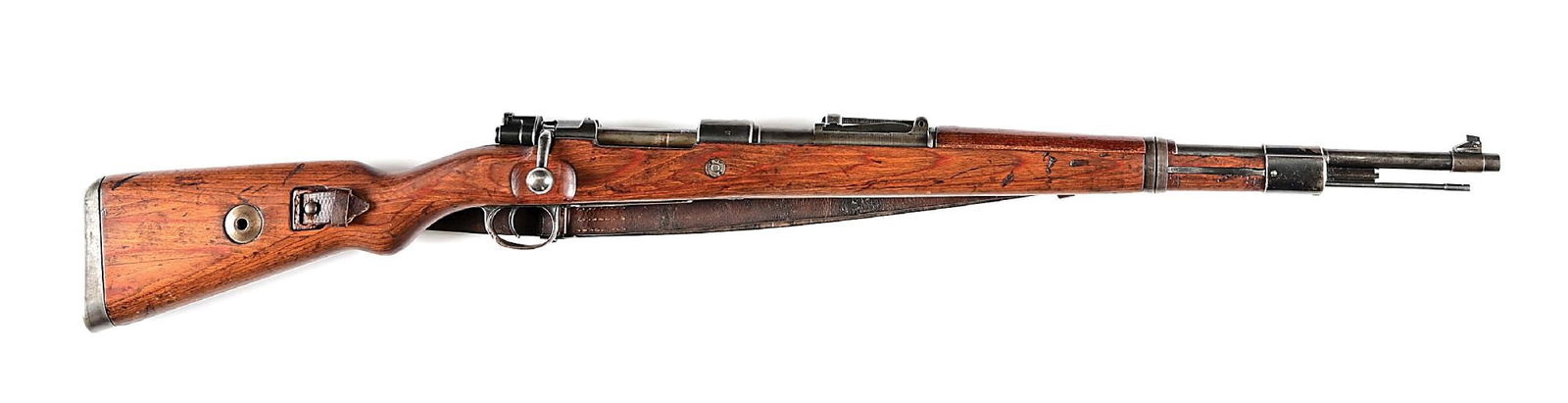 (C) MAUSER BYF 43 CODE K98 BOLT ACTION RIFLE.: Manufactured at Oberndorf in 1943. Features include blue finish, a blade front sight, tangent rear, red glue laminate stocks, stamped nose cap, milled barrel band, stamped bottom metal, and cupped but