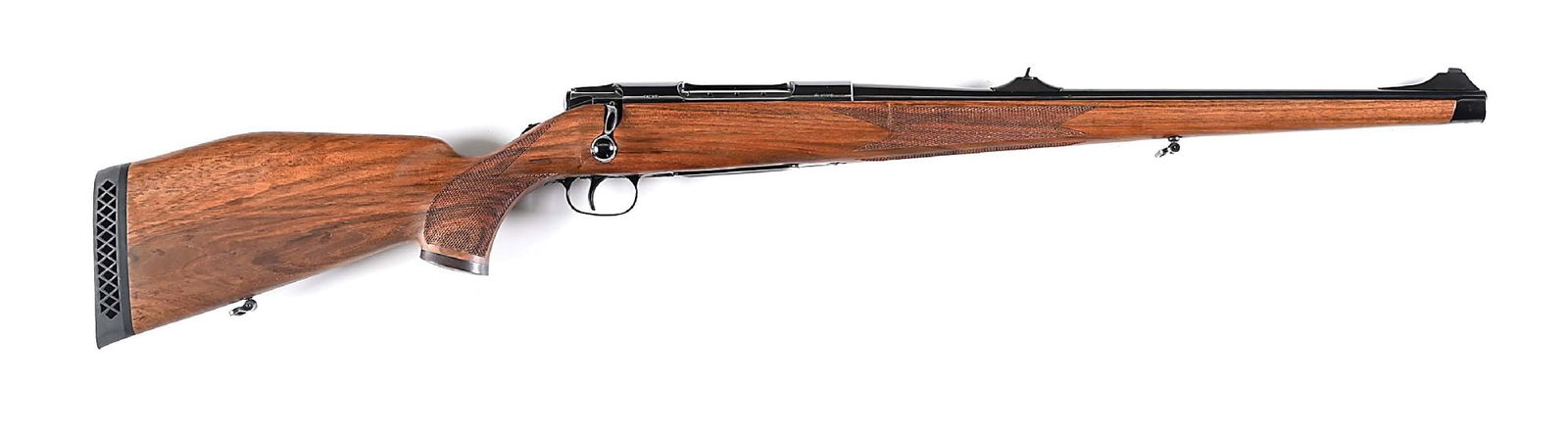 (M) SCARCE GERMAN J.P. SAUER MODEL 90 MANNLICHER BOLT ACTION RIFLE.: Made in West Germany. Features a full length oil finish walnut stock, hand checkered, pistol grip with contrasting wood grip cap and Sauer monogram, European Hog Back style Monet Carlo comb, black waf