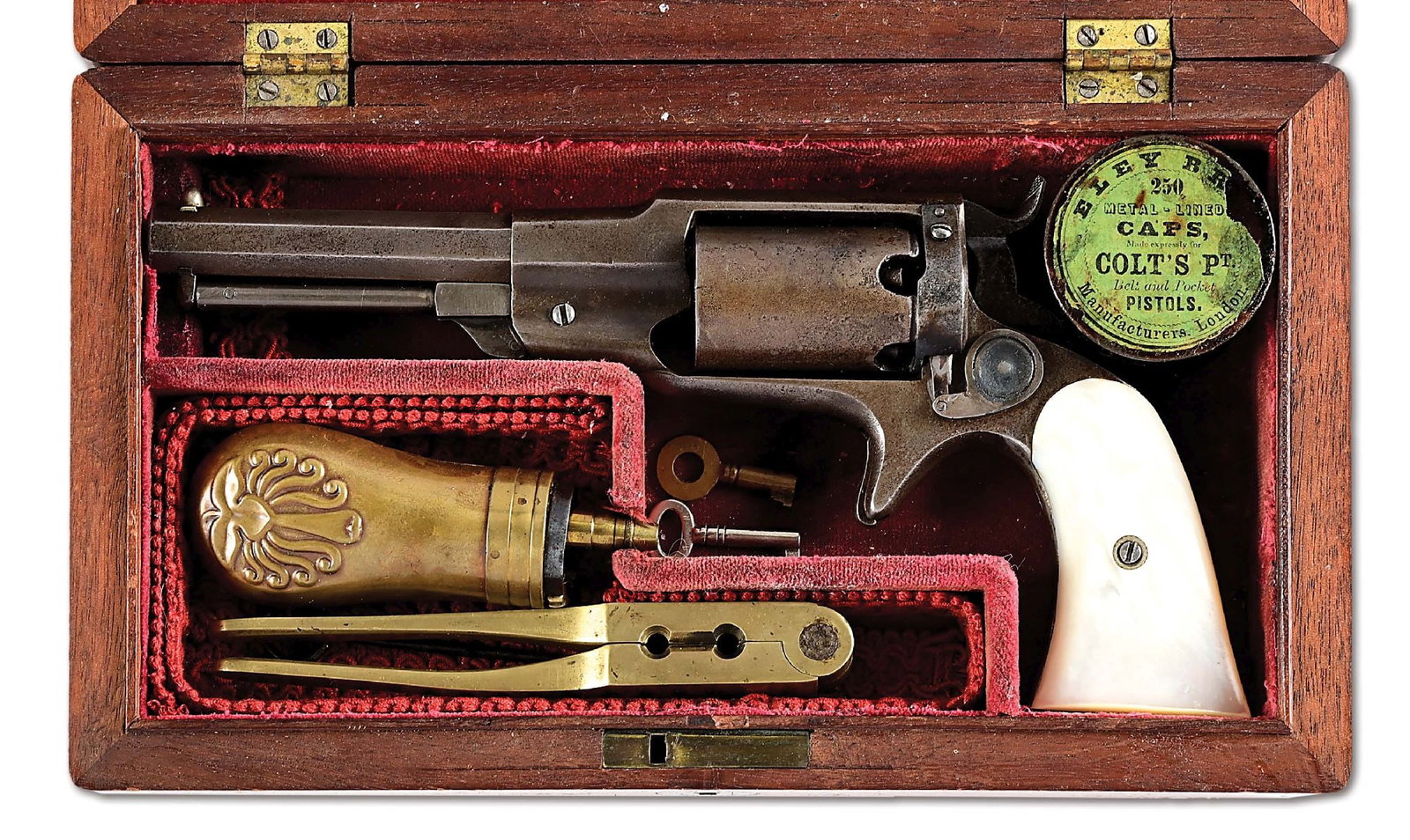 (A) SCARCE CASED REMINGTON BEALS 3RD MODEL PERCUSSION REVOLVER WITH PEARL GRIPS.: Approximately 1000 were manufactured from 1859-1860. Features octagon barrel, loading lever, and pearl grips. Top of barrel has the Remington legends. Comes in period wood case with small brass flask,