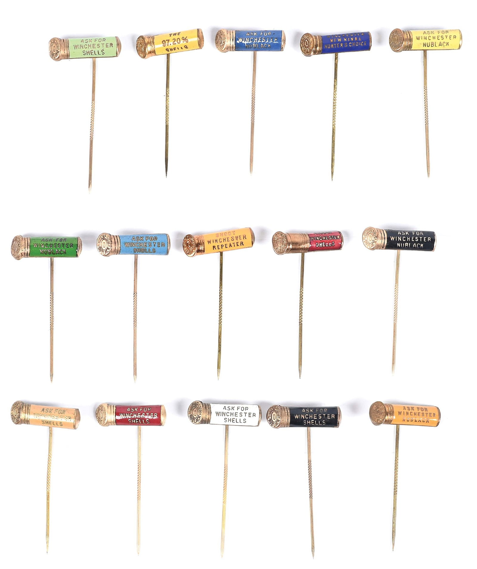 LOT OF 15: WINCHESTER SHOTGUN SHELL STICK PINS.: Fine, early brass advertising stickpins for Winchester brand shotgun shells, featuring finely detailed tri-colored cloisonne enameled porcelain. Each embossed brass shotgun shell is 1" wide on a 2" st