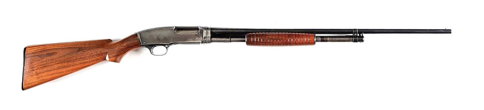 (C) 1ST YEAR WINCHESTER MODEL 42 SLIDE ACTION TAKEDOWN SHOTGUN IN .410 (1933).: Manufactured in 1933. Features a blue finish, take down, single bead sight, plain pistol grip walnut stock, Winchester black buttplate, round grooved forearm. CONDITION: Fine. Receiver retains about 8