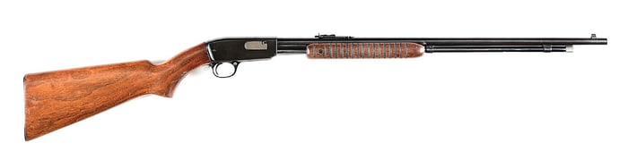 (C) WINCHESTER MODEL 61 SLIDE ACTION RIFLE (1949).