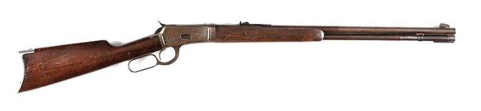 (A) FIRST YEAR WINCHESTER MODEL 1892 LEVER ACTION TAKEDOWN RIFLE (1892).