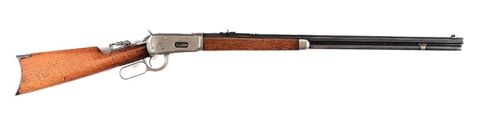 (C) WINCHESTER MODEL 1894 LEVER ACTION RIFLE IN .25-35 WCF (1908).