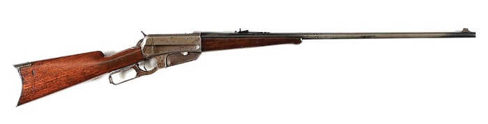 (C) WINCHESTER MODEL 1895 LEVER ACTION RIFLE IN .303 BRITISH.