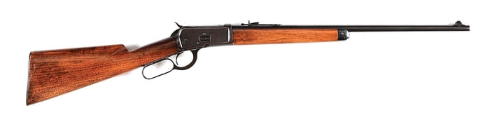 (C) EARLY PRODUCTION WINCHESTER MODEL 53 LEVER ACTION RIFLE IN .25-20 (1924).
