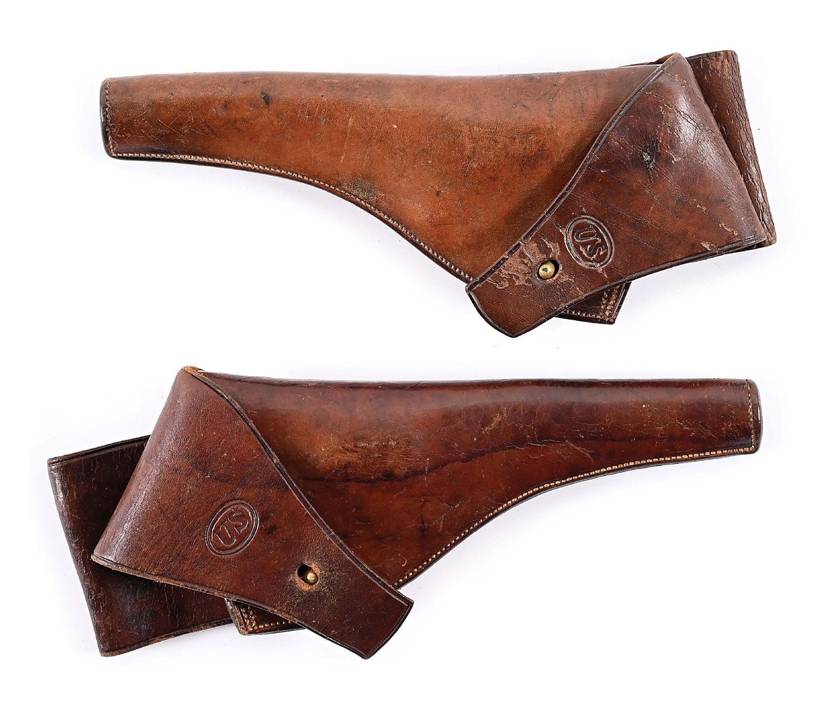 LOT OF 2: M1892 TYPE 3 MAESTRANZA DE MANILA HOLSTERS.: Lot consists of 2 Maestranza de Manila Type 2 .38 caliber revolver holsters. Although the holsters are devoid of maker markings, the stylized "US" and construction are traced to the Maestranza de Mani