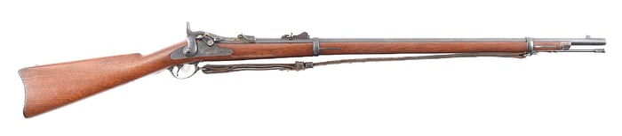 (A) OUTSTANDING US SPRINGFIELD MODEL 1879 TRAPDOOR RIFLE.