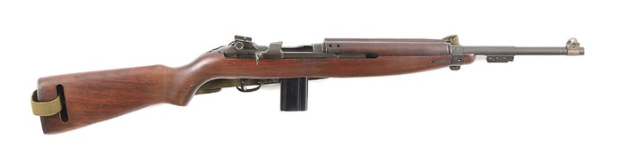 (C) INLAND M1 CARBINE SEMI-AUTOMATIC RIFLE.