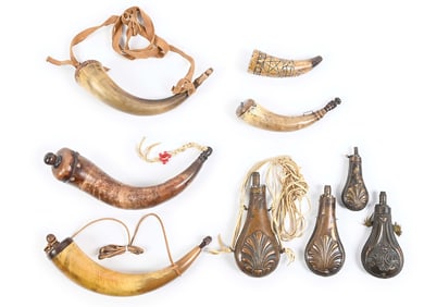 LOT OF POWDER HORNS AND POWDER FLASKS.