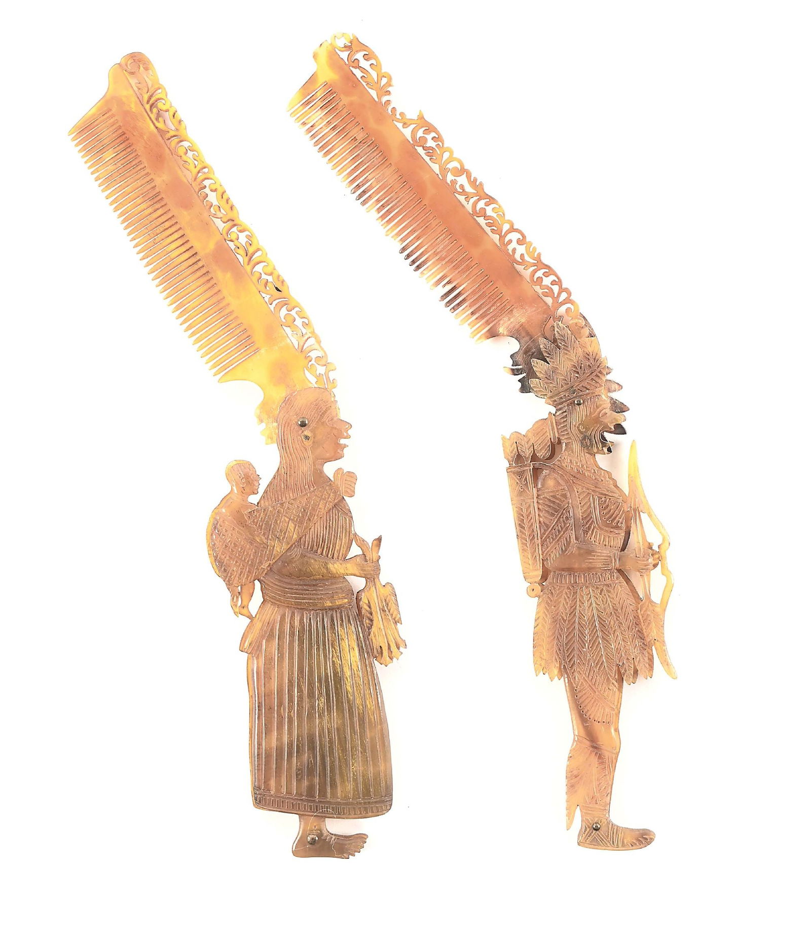 LOT OF 2: ANTIQUE NATIVE AMERICAN THEMED COMBS.: Lot consists of: (A) Tortoise shell carved, highly detailed hinged comb of Native American woman with papoose and holding hunted geese or ducks. (B) Tortoise shell carved, highly detailed hinged comb