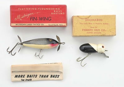 FIN WING AND DOODLE BUG LURES IN BOXES
