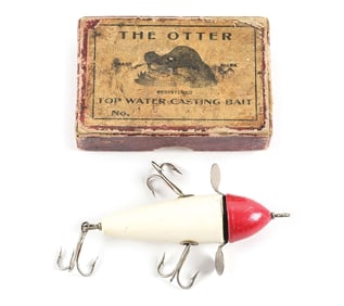 SHAKESPEARE ROTARY HEAD BAIT IN RED & WHITE IN OTTER BOX