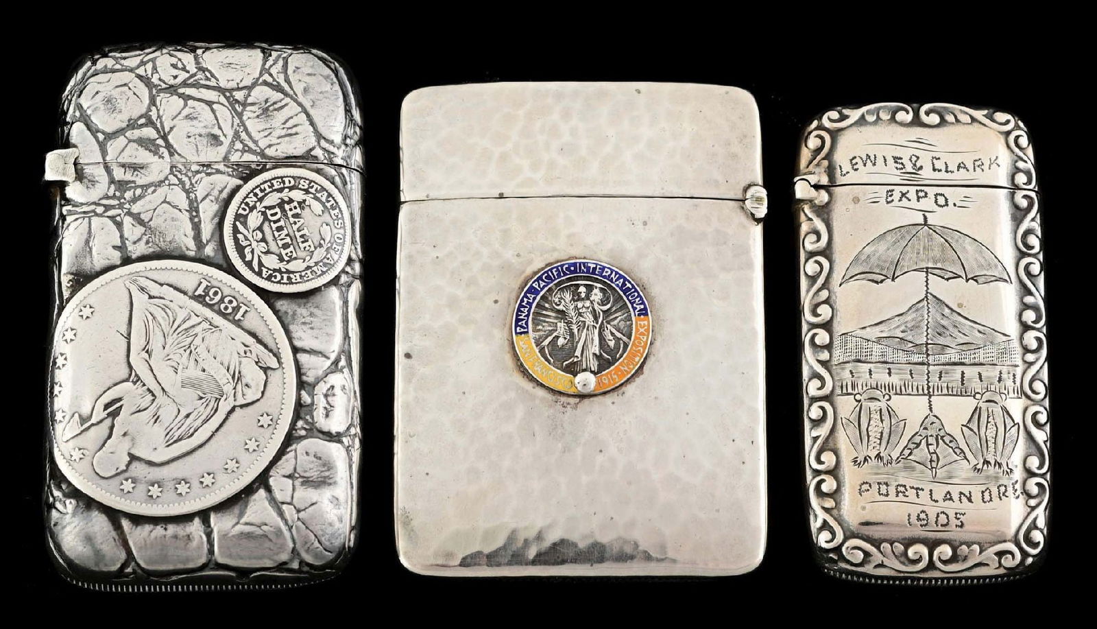 LOT OF 3: STERLING SILVER MATCH SAFES: (A) V. S. Coins by Gorham. (B) Lewis and Clark Expo, Portland, Oregon 1905 by Gorham. (C) Pan-Pacific International Panama Pacific San Francisco 1915 Expo by James Blake & Co. CONDITION: Strong hinges