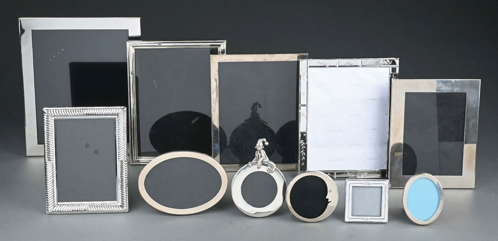 A GROUP OF 11 TIFFANY STERLING PHOTO FRAMES (1 of 6)