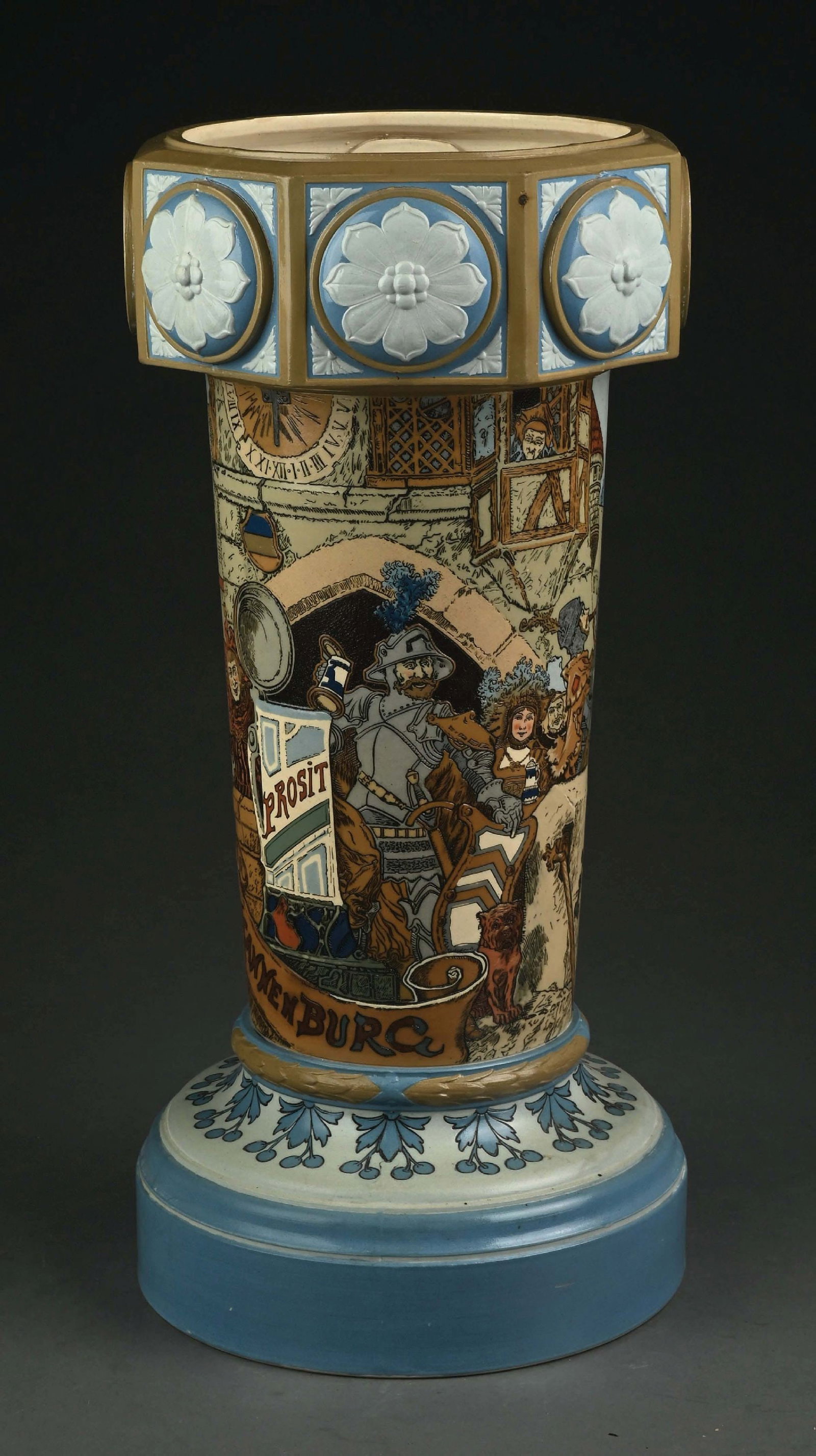 LARGE METTLACH TAPPER STAND W/ CASTLE SCENE: Nice large Mettlach tapper stand. Nice color and condition. Condition: (Excellent) Dimensions: 9 - 1/2" x 9 - 1/2" x 20".