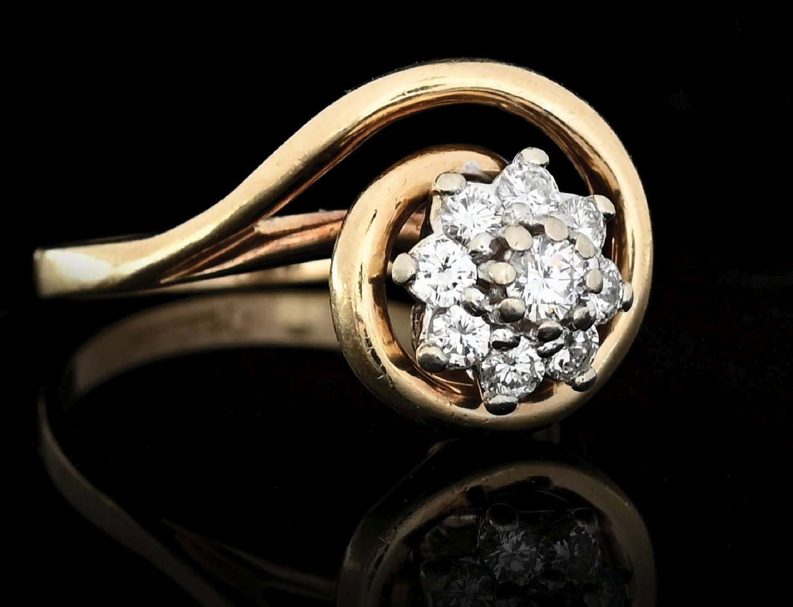 14K YELLOW GOLD DIAMOND FASHION RING W/ APPRAISAL: Ladies' 14k yellow gold diamond fashion ring set with 9 round full-cut diamonds with a total weight of 0.50cts. Marked "14K" inside shank. Gross weight is 5.4 grams. Ring size 8. Accompanied by an app