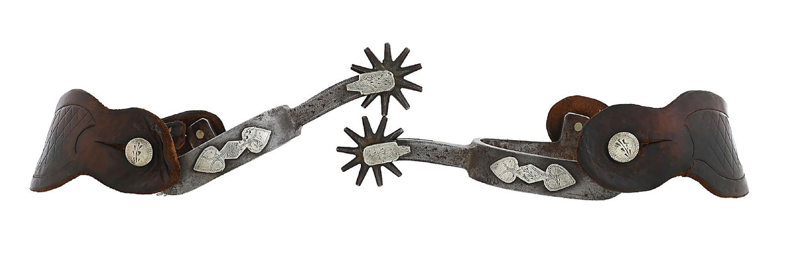 AUGUST BUERMANN #2045 TEXAS STYLE SPURS: Opposing spade and diamond overlays on the 3/4" band, a 2 1/4" shank with covered tips and a 1 1/2" rowel. These are a very nice pair in overall fine condition with even gray patina and sharp engravin