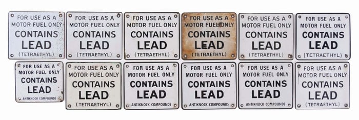 COLLECTION OF 12: CONTAINS LEAD PORCELAIN GAS PUMP SIGNS