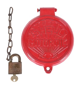 COLLECTION OF TWO: SHELL EMBOSSED LUBSTER LID & SHELL BRASS LOCK