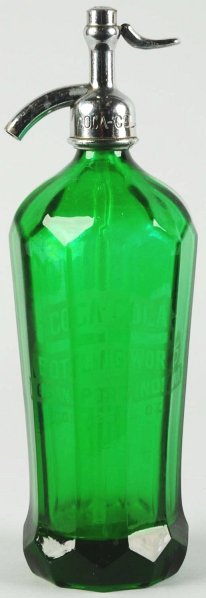 Logansport, IN Coca-Cola Fluted Seltzer Bottle.: Minor nicks and light wear. Coca-Cola Logansport stamped on cap. Condition (Excellent). Size 12" T.