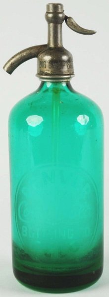 Green Glass Denver, CO Coca-Cola Seltzer Bottle.: Big Chief Bottling Co. on cap. Light surface marks and soiling with a few tiny nicks. Condition (Very Good - Excellent). Size 11" T.